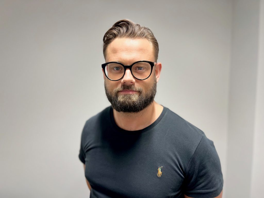 Man with beard and glasses