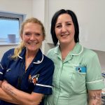 Two women in nursing uniform